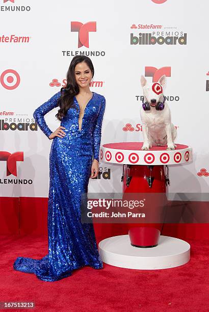 Natty Natasha celebrates with Bullseye, Target's Beloved Bull Terrier Mascot, at the 2013 Billboard Latin Music Awards at BankUnited Center on April...