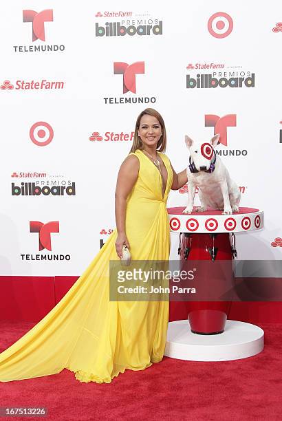 Adamari Lopez celebrates with Bullseye, Target's Beloved Bull Terrier Mascot, at the 2013 Billboard Latin Music Awards at BankUnited Center on April...