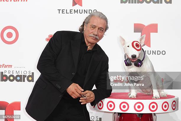 Edward James Olmos celebrates with Bullseye, Target's Beloved Bull Terrier Mascot, at the 2013 Billboard Latin Music Awards at BankUnited Center on...