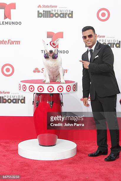 Tito El Bambino celebrates with Bullseye, Target's Beloved Bull Terrier Mascot, at the 2013 Billboard Latin Music Awards at BankUnited Center on...
