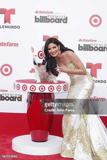 Cynthia Olavarria celebrates with Bullseye, Target's Beloved Bull Terrier Mascot, at the 2013 Billboard Latin Music Awards at BankUnited Center on...
