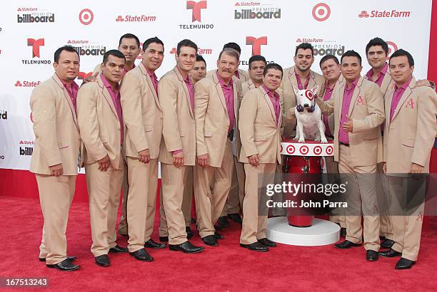 La Arrolladora Banda El Limon celebrates with Bullseye, Target's Beloved Bull Terrier Mascot, at the 2013 Billboard Latin Music Awards at BankUnited...