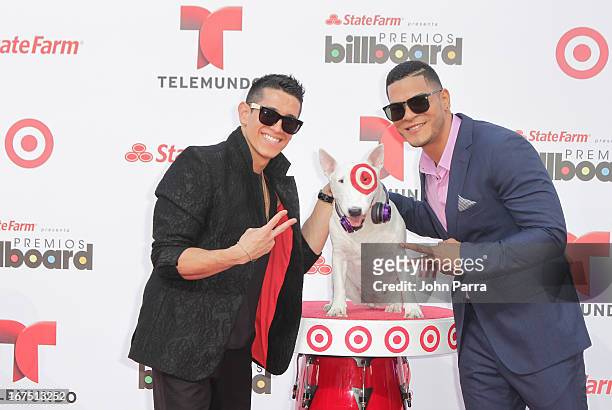 Lenny and Dyland celebrates with Bullseye, Target's Beloved Bull Terrier Mascot, at the 2013 Billboard Latin Music Awards at BankUnited Center on...