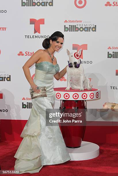 Karen Sierra celebrates with Bullseye, Target's Beloved Bull Terrier Mascot, at the 2013 Billboard Latin Music Awards at BankUnited Center on April...