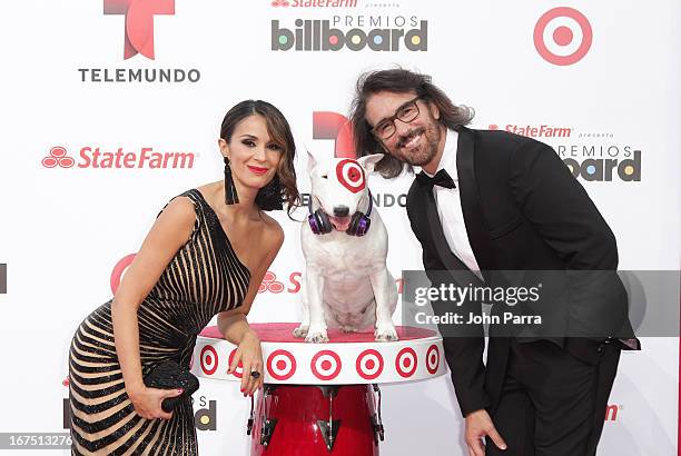 Catherine Siachoque and Miguel Varoni celebrates with Bullseye, Target's Beloved Bull Terrier Mascot, at the 2013 Billboard Latin Music Awards at...
