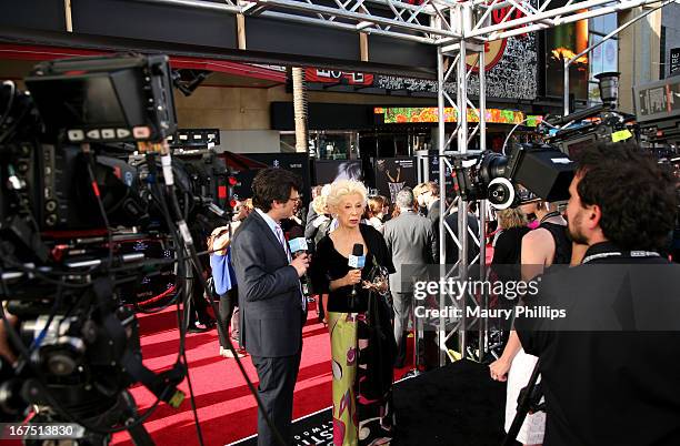 Host Ben Mankiewicz and actress France Nuyen attend the "Funny Girl" screening during the 2013 TCM Classic Film Festival Opening Night at TCL Chinese...