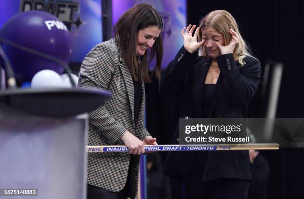 Rebecca Leslie wipes tears after being drafted in the 11th round by Toronto GM Gina Kingsbury at the inaugural Professional Women's Hockey League...