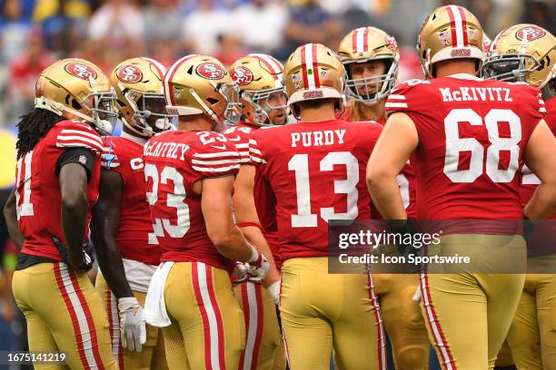 San Francisco 49ers quarterback Brock Purdy leads the offense in a huddle during the NFL game between the San Francisco 49ers and the Los Angeles...