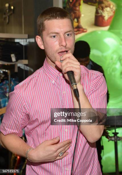 Marc Griffin of the band 2AM Club performs as Sportiqe and ESPN host a NBA Playoff Party at Bloomingdale's 59th Street Store on April 25, 2013 in New...