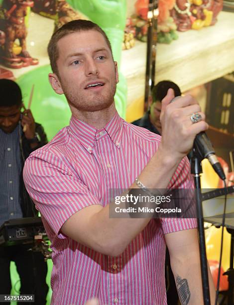 Marc Griffin of the band 2AM Club performs as Sportiqe and ESPN host a NBA Playoff Party at Bloomingdale's 59th Street Store on April 25, 2013 in New...
