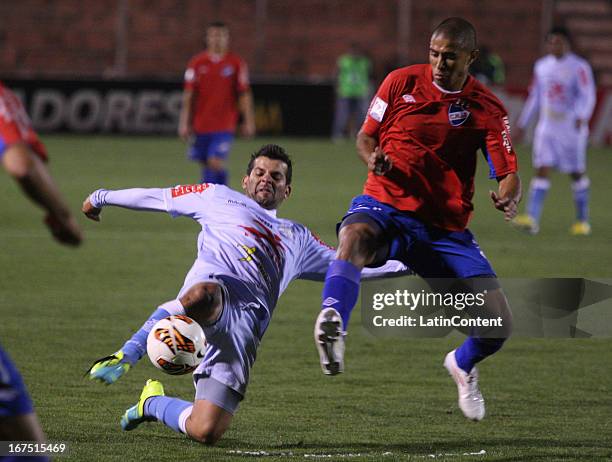 Fabio Ramos of Real Garcilaso fights for the ball with Diego Arismendi of Nacional during the match between Real Garcilaso of Peru and Nacional of...