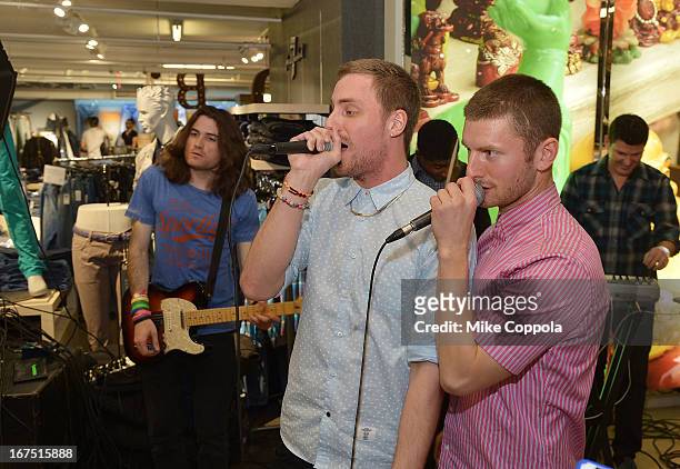 Tyler Cordy and Marc Griffin of the band 2AM Club perform as Sportiqe and ESPN host a NBA Playoff Party at Bloomingdale's 59th Street Store on April...