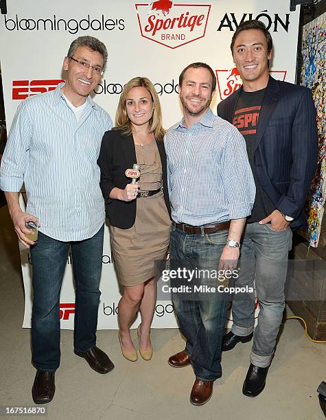 Josh Romm, Brittany Boehm, Matt Novoselsky, Autin Chow pose for a picture as Sportiqe and ESPN host a NBA Playoff Party at Bloomingdale's 59th Street...