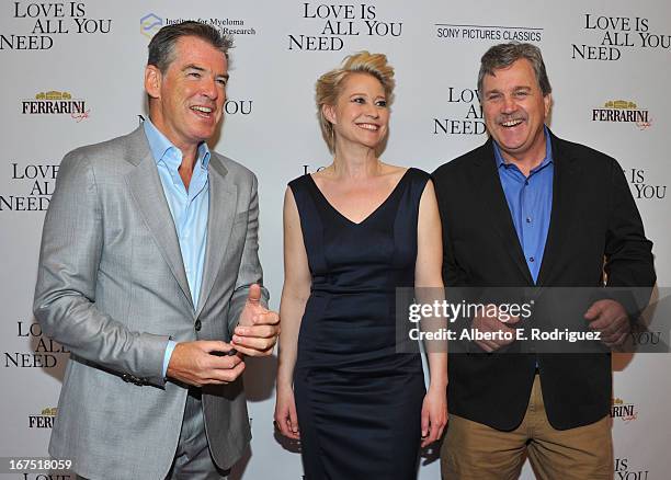 Actors Pierce Brosnan, Trine Dyrholm and Sony Pictures Classics Co-President Tom Bernard arrive to the premiere of Sony Pictures Classics' "Love Is...