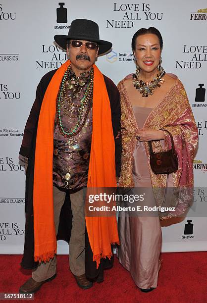 Designers Sue Wong and Romeo Shresta arrive to the premiere of Sony Pictures Classics' "Love Is All You Need" at Linwood Dunn Theater at the Pickford...