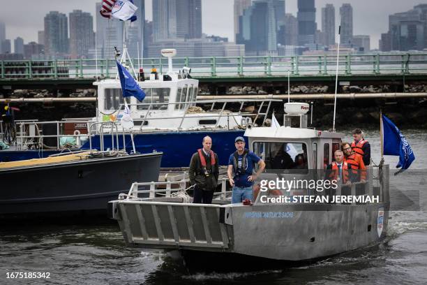 Britain's Prince William, Prince of Wales, travels by boat to meet students from the Urban Assembly New York Harbor School regarding the nonprofit...