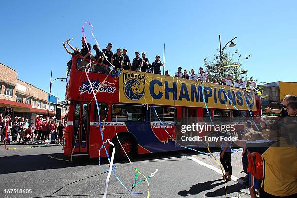 Mariners players wave to fans during the Central Coast Mariners A-League grand Final celebrations on April 26, 2013 in Gosford, Australia.