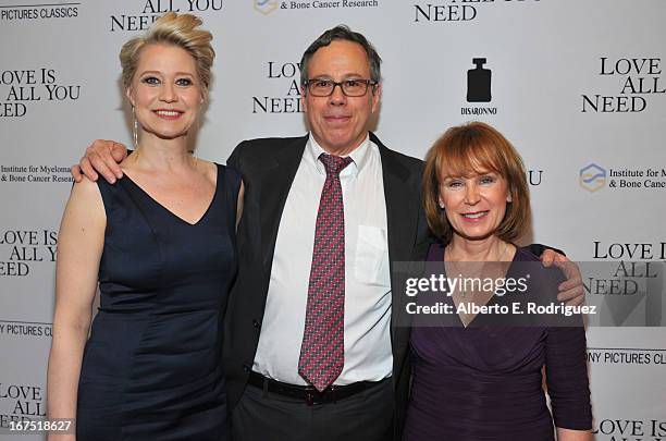 Actress Trine Dyrholm, CEO & President, IMBCR.org James Berenson and Event Chair, IMBCR.org Debra Berenson arrive to the premiere of Sony Pictures...