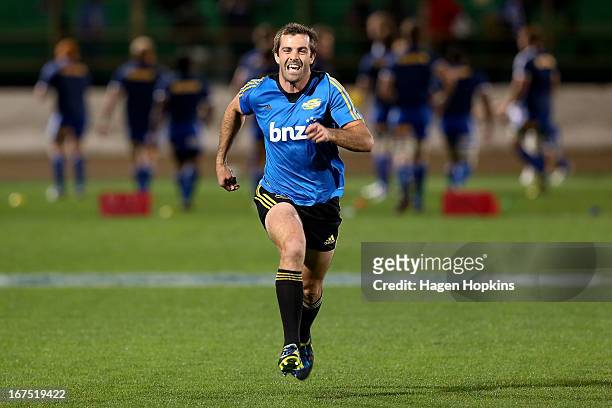 Conrad Smith of the Hurricanes warms up during the round 11 Super Rugby match between the Hurricanes and the Stormers at FMG Stadium on April 26,...