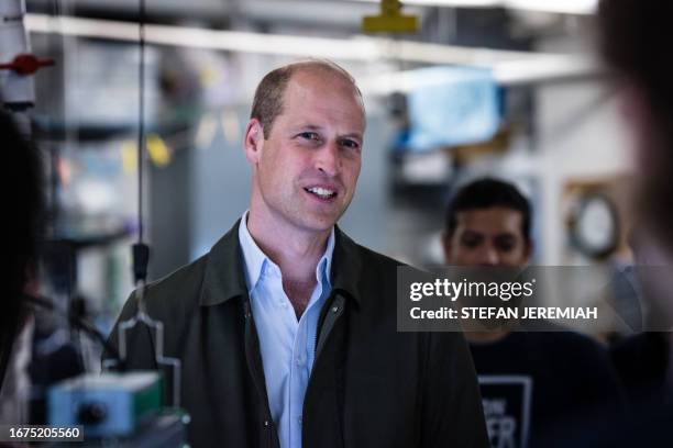 Britain's Prince William, Prince of Wales, speaks with students from the Urban Assembly New York Harbor School regarding the nonprofit organization...