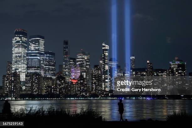 The annual Tribute in Light is illuminated above the skyline of lower Manhattan on the 22nd anniversary of the 9/11 attacks in New York City on...