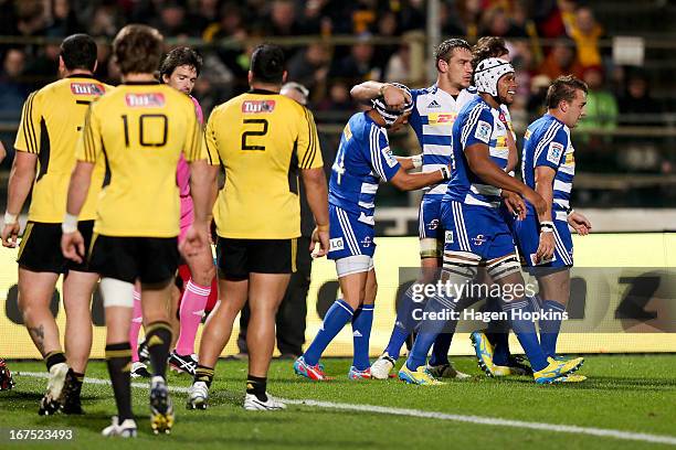 Stormers players celebrate the try of Gio Aplon during the round 11 Super Rugby match between the Hurricanes and the Stormers at FMG Stadium on April...