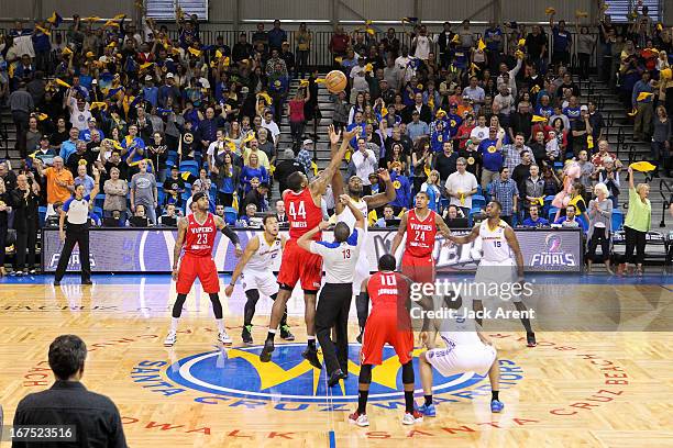 Chris Daniels of the Rio Grande Valley Vipers reaches for the opening tip-off against Hilton Armstrong of the Santa Cruz Warriors during Game One of...