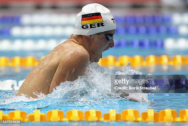 Philipp Forster of SC Wiesbaden 1911 competes in the men's 200 m individual medley heat during day one of the German Swimming Championship 2013 at...