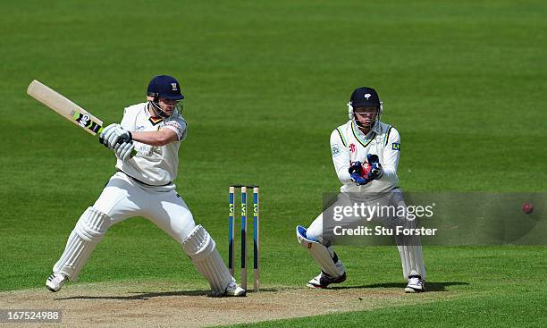 Durham batsman Mark Stoneman cuts a ball to the boundary watched by Yorkshire wicketkeeper Jonathan Bairstow during day three of the LV County...