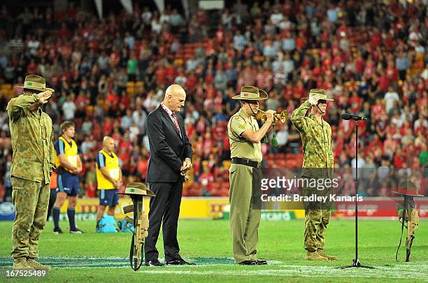 The last post is played before the round 11 Super Rugby match between the Reds and the Blues at Suncorp Stadium on April 26, 2013 in Brisbane,...