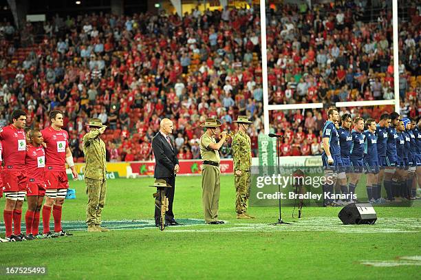 The last post is played before the round 11 Super Rugby match between the Reds and the Blues at Suncorp Stadium on April 26, 2013 in Brisbane,...
