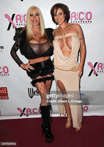Adult film stars Elizabeth Satrr and Eva Naughty arrive for the 29th Annual XRCO Awards held at SupperClub Los Angeles on April 25, 2013 in...