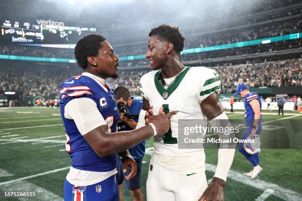 Stefon Diggs of the Buffalo Bills chats with Sauce Gardner of the New York Jets following a game at MetLife Stadium on September 11, 2023 in East...