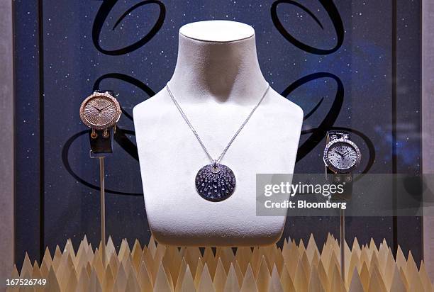 Display of Xtravaganza wristwatches, manufactured by Chopard & Cie SA, are seen in a window at the company's booth during the Baselworld watch fair...