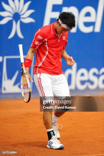 Kei Nishikori of Japan reacts after missing a point against Albert Ramos of Spain during day five of the 2013 Barcelona Open Banc Sabadell on April...