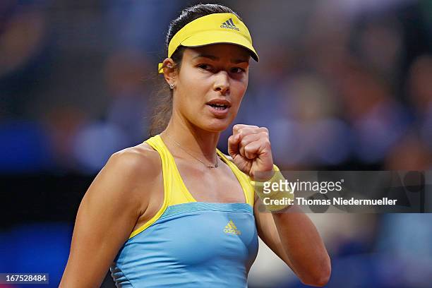 Ana Ivanovic of Serbia reacts during her match against Maria Sharapova of Russia during Day 5 of the Porsche Tennis Grand Prix at at Porsche-Arena on...