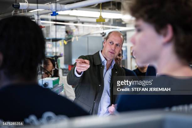 Britain's Prince William, Prince of Wales, speaks with students from the Urban Assembly New York Harbor School regarding the nonprofit organization...