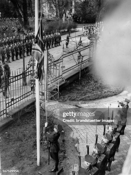 Sergt.Maj. A. Saunders moves down the Union Jack, thus ending the 11 years Britisch Occupation of the Rhine. British headquarter in Wiesbaden....