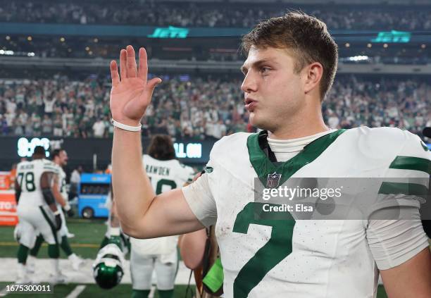 Zach Wilson of the New York Jets celebrates the win over the Buffalo Bills in overtime during the NFL game at MetLife Stadium on September 11, 2023...