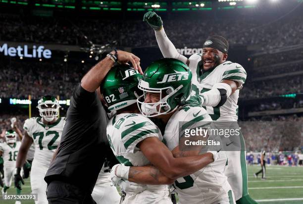 Wide receiver Xavier Gipson of the New York Jets celebrates with Allen Lazard, Michael Carter II and head coach Robert Saleh after scoring the game...