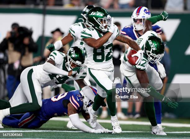 Wide receiver Xavier Gipson of the New York Jets scores the game winning touchdown on a 65-yard punt return during the overtime quarter of the NFL...