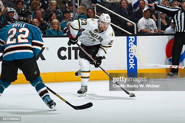 Tom Wandell of the Dallas Stars handles the puck against Dan Boyle of the San Jose Sharks at the HP Pavilion on April 23, 2013 in San Jose,...