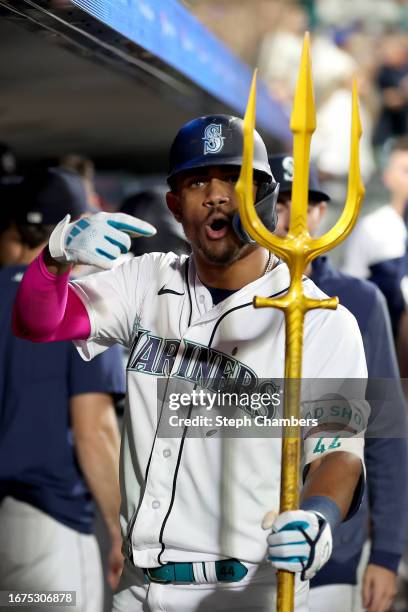 Julio Rodriguez of the Seattle Mariners celebrates his two run home run during the tenth inning against the Los Angeles Angels at T-Mobile Park on...