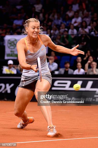 Maria Sharapova of Russia plays a forehand in her match against Ana Ivanovic of Serbia during Day 5 of the Porsche Tennis Grand Prix at Porsche-Arena...