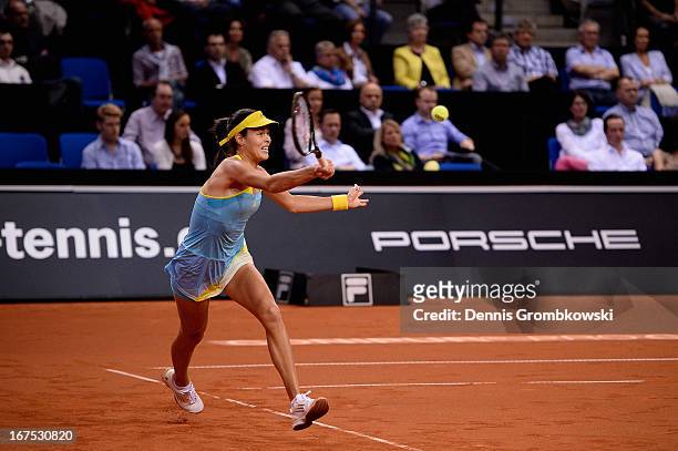 Ana Ivanovic of Serbia plays a forehand in her match against Maria Sharapova of Russia during Day 5 of the Porsche Tennis Grand Prix at Porsche-Arena...