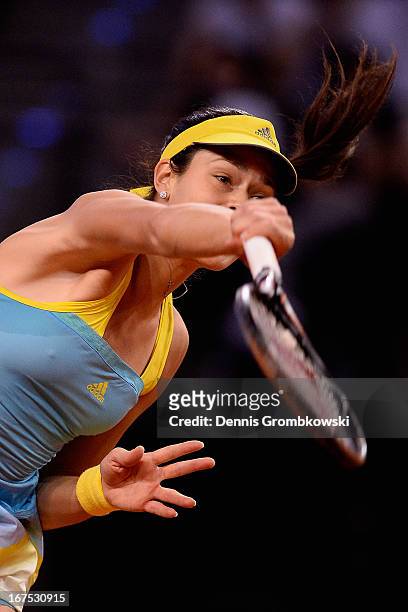 Ana Ivanovic of Serbia serves in her match against Maria Sharapova of Russia during Day 5 of the Porsche Tennis Grand Prix at Porsche-Arena on April...