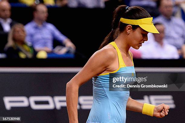 Ana Ivanovic of Serbia reacts during her match against Maria Sharapova of Russia during Day 5 of the Porsche Tennis Grand Prix at Porsche-Arena on...