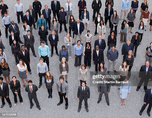 portrait of business people in crowd - business man in crowd stock pictures, royalty-free photos & images