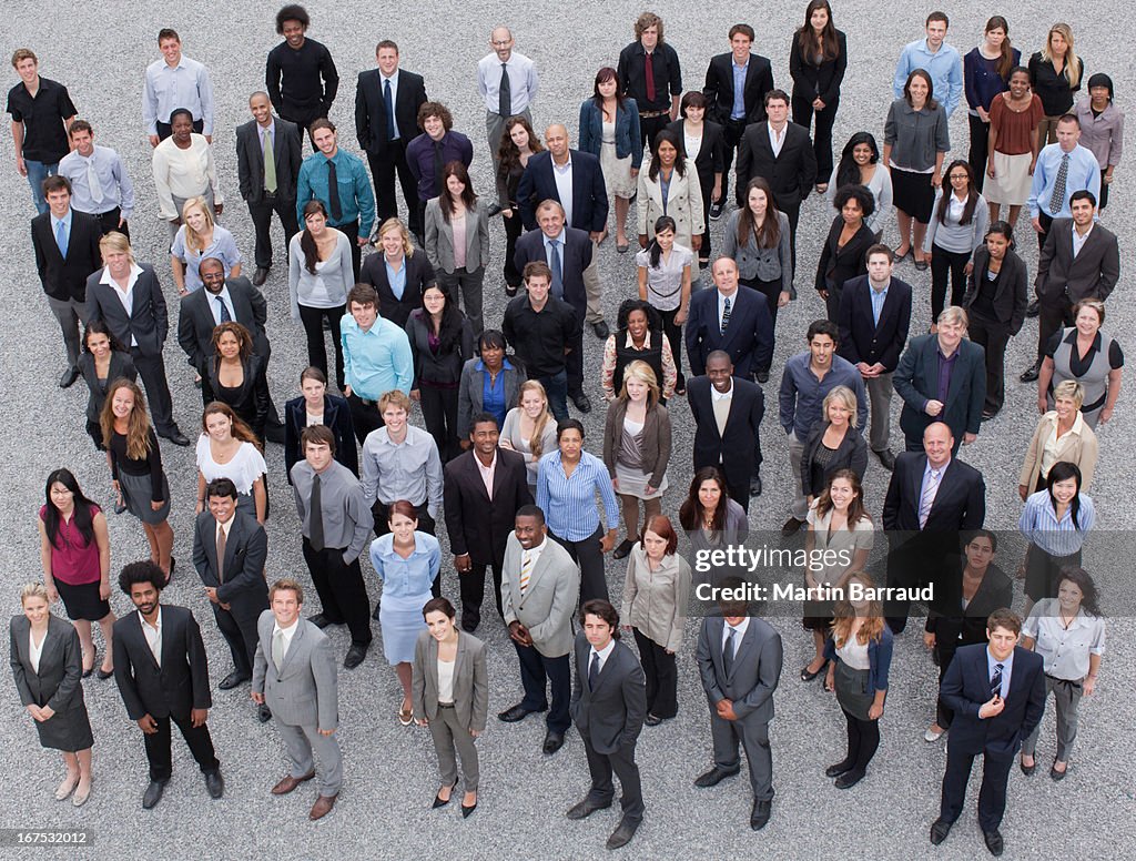 Portrait of business people in crowd
