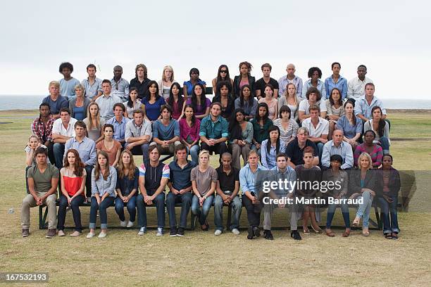 group of spectators on bleachers - stadium seats stock pictures, royalty-free photos & images